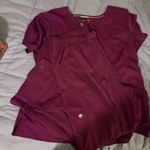 HH Works by healing hands scrubs. Wine color